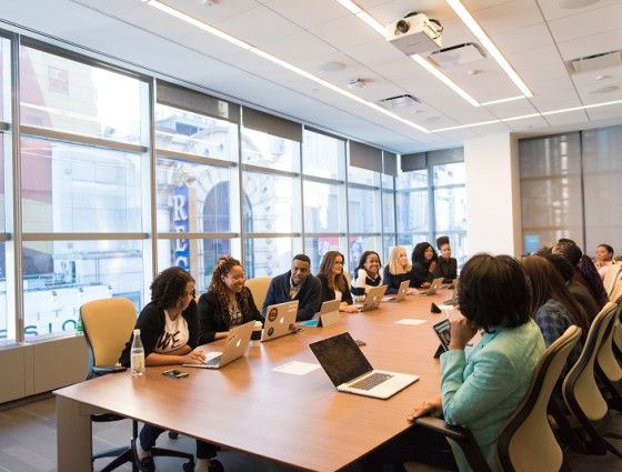 An image of a board meeting taking place