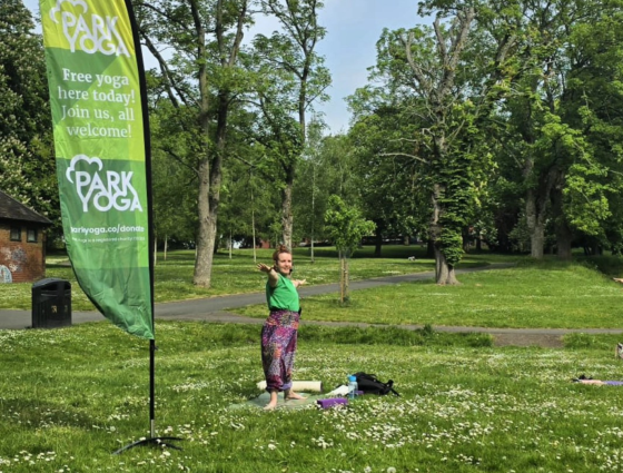 Kat Gibby teaching Park Yoga