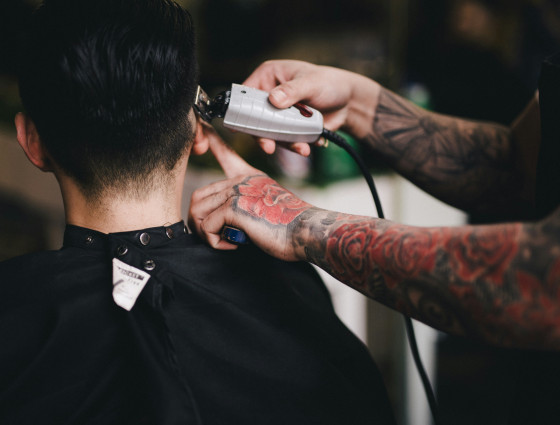 Image of a person having their hair cut