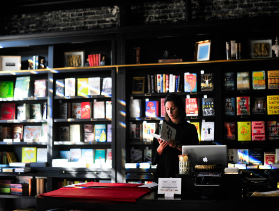 Image of a woman working in a book shop