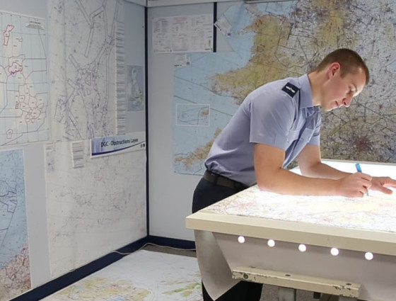 Image of a man drawing a map