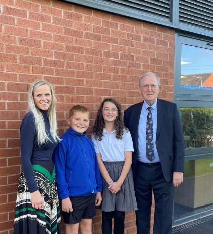 Headteacher Deena Frost and Councillor David Chambers with pupils Dylan (year 5) and Arabella (year 6)