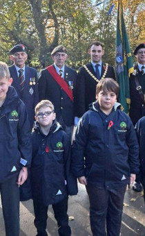 Pupils from Perryfields PRU stand with veterans and Regimental Association Reps