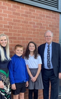 Headteacher Deena Frost and Councillor David Chambers with pupils Dylan (year 5) and Arabella (year 6)