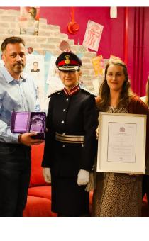 the Lord-Lieutenant presenting the KAVS award to Ourside in May 2024